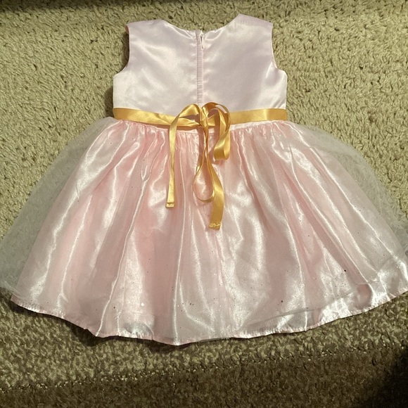 Dorissa sparkle tulle pink dress with a gold tie. - Picture 5 of 7